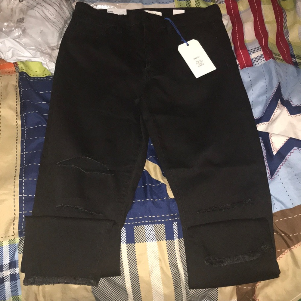 NEW WITH TAGS black hi rise ripped jeans